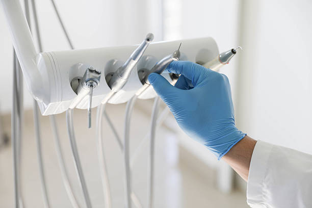 Professional Tooth Extraction technician working in Andrews, IN